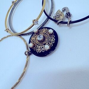 Vintage Juicy Couture Gold and Black Charm Bracelet Set with Locket.